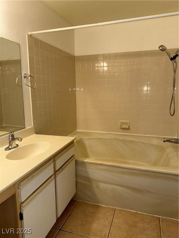full bathroom featuring tile patterned flooring, shower / bathtub combination, and vanity