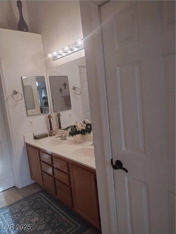 bathroom featuring double vanity