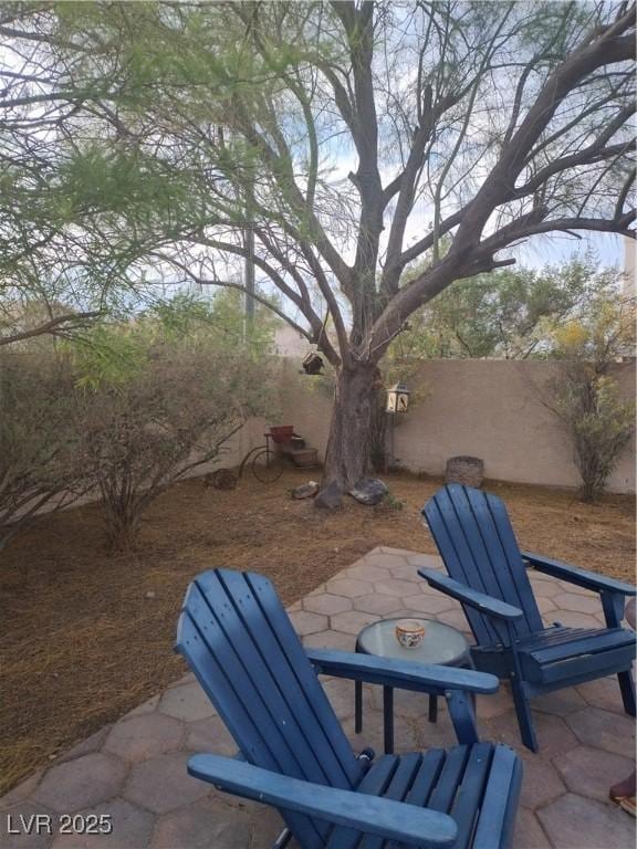 7894 W Patrick Ln, Las Vegas, NV 89113 - view of patio / terrace with a fenced backyard