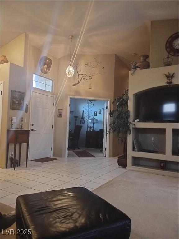 living area featuring tile patterned flooring