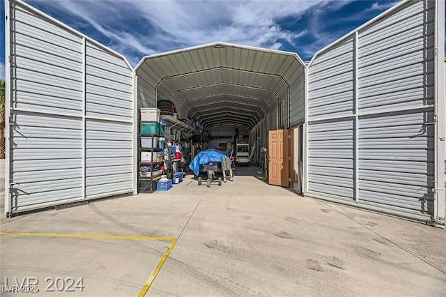 5202 Willis St, North Las Vegas, NV 89031 - view of parking / parking lot featuring a detached carport