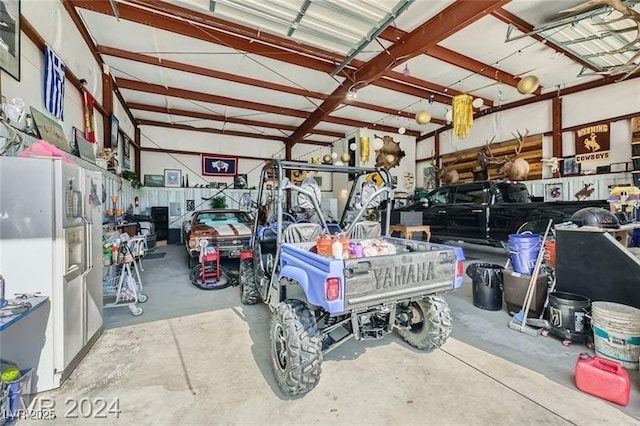 5202 Willis St, North Las Vegas, NV 89031 - garage with refrigerator with ice dispenser