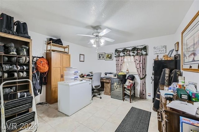 5202 Willis St, North Las Vegas, NV 89031 - laundry area featuring a desk, a ceiling fan, and light tile patterned flooring