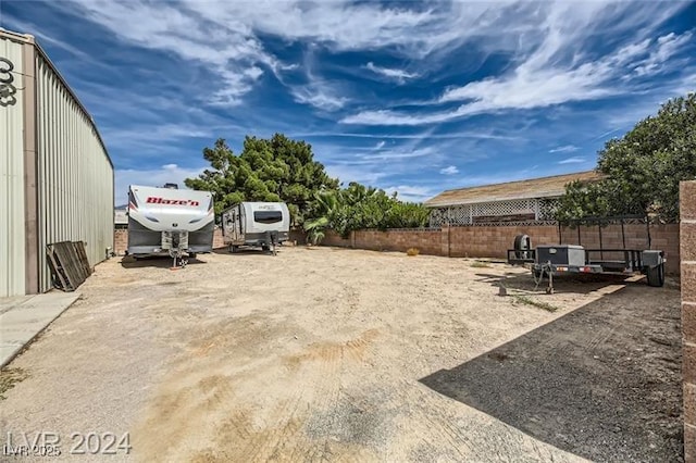 5202 Willis St, North Las Vegas, NV 89031 - view of yard featuring fence
