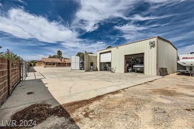 5202 Willis St, North Las Vegas, NV 89031 - view of outdoor structure with fence and an outdoor structure