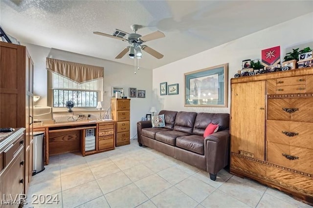 5202 Willis St, North Las Vegas, NV 89031 - living room with ceiling fan and light tile patterned floors