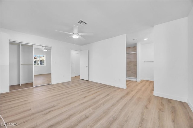 1616 Yellow Rose St, Las Vegas, NV 89108 - unfurnished bedroom featuring light wood-type flooring, baseboards, ceiling fan, and a closet