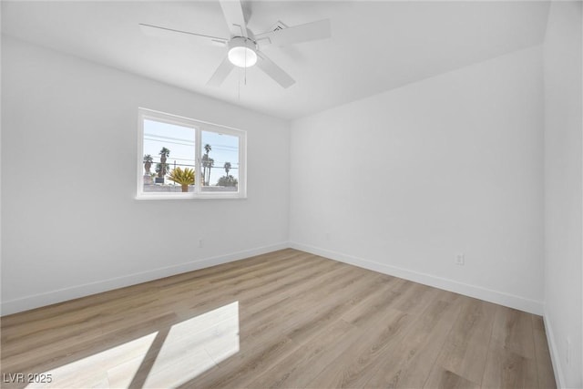 1616 Yellow Rose St, Las Vegas, NV 89108 - spare room with wood finished floors, baseboards, and a ceiling fan
