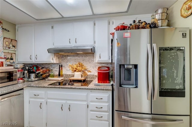 604 N Torrey Pines Dr, Las Vegas, NV 89107 - kitchen with stainless steel appliances, under cabinet range hood, white cabinets, backsplash, and light countertops