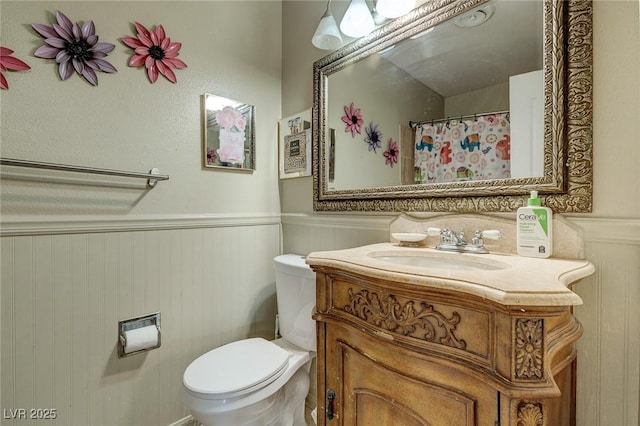 604 N Torrey Pines Dr, Las Vegas, NV 89107 - full bath with wainscoting, toilet, and vanity