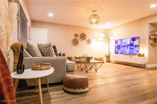 2043 Sombrero Dr, Las Vegas, NV 89169 - living room featuring wood finished floors, recessed lighting, and baseboards