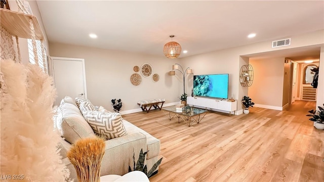 2043 Sombrero Dr, Las Vegas, NV 89169 - living room with recessed lighting, stairs, wood finished floors, and baseboards