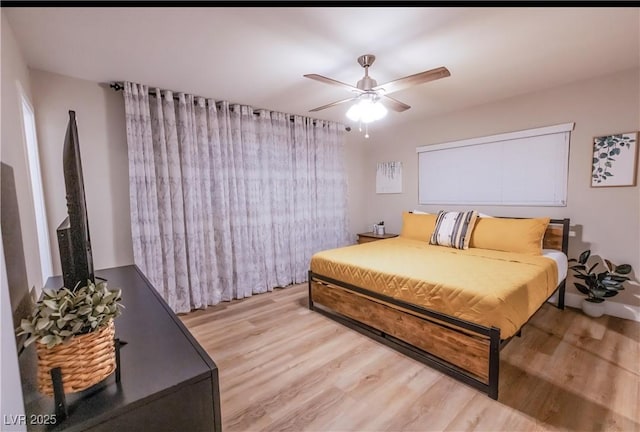 2043 Sombrero Dr, Las Vegas, NV 89169 - bedroom featuring light wood-style floors and a ceiling fan