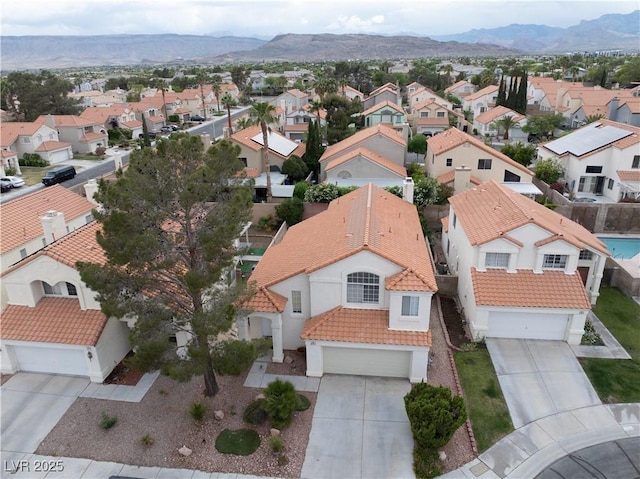 aerial perspective of suburban area featuring mountains