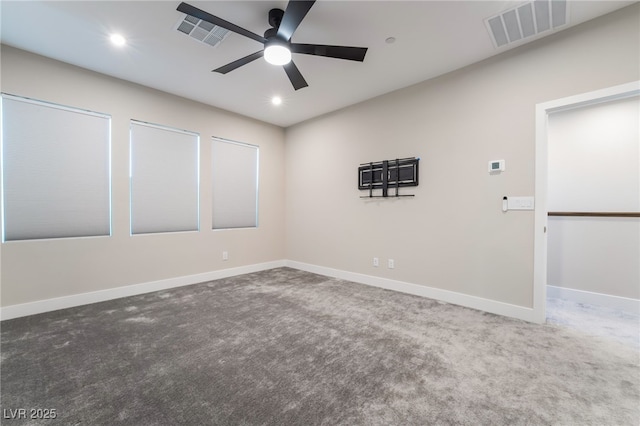 carpeted empty room featuring ceiling fan, recessed lighting, and baseboards