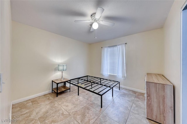 632 Arrayo Way, Boulder City, NV 89005 - rec room with ceiling fan, light tile patterned flooring, and baseboards