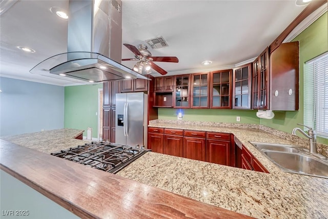 632 Arrayo Way, Boulder City, NV 89005 - kitchen featuring stainless steel fridge, island range hood, a sink, stovetop, and ceiling fan