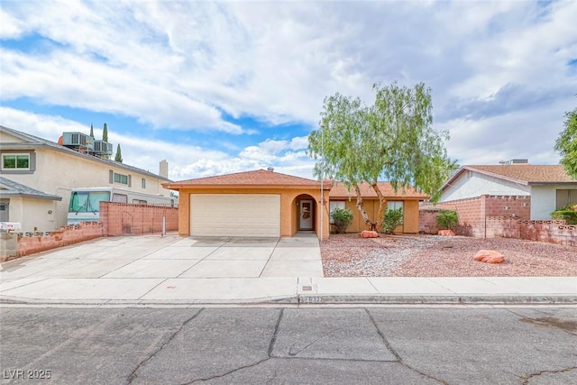 632 Arrayo Way, Boulder City, NV 89005 - single story home featuring an attached garage, fence, driveway, stucco siding, and cooling unit