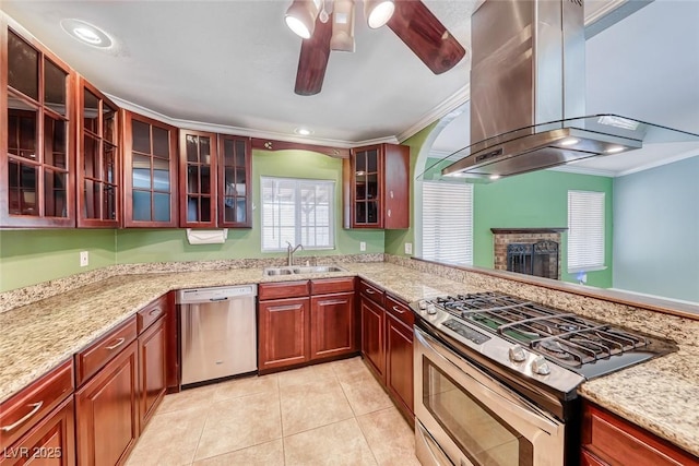632 Arrayo Way, Boulder City, NV 89005 - kitchen featuring appliances with stainless steel finishes, a sink, island exhaust hood, crown molding, and ceiling fan