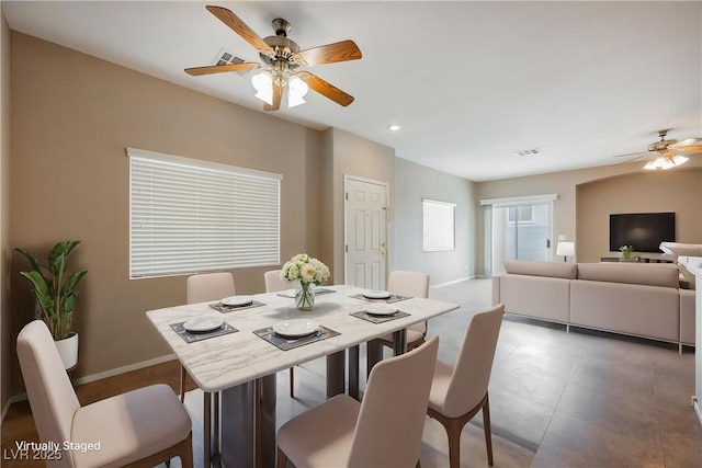 dining space with a ceiling fan, baseboards, and recessed lighting