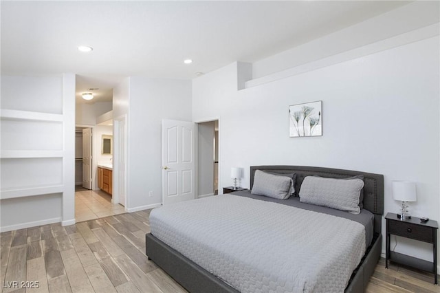 1246 E Gary Ave, Las Vegas, NV 89123 - bedroom featuring light wood finished floors, recessed lighting, baseboards, and ensuite bathroom