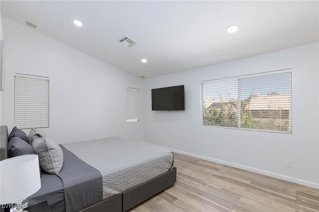 1246 E Gary Ave, Las Vegas, NV 89123 - bedroom with light wood-style flooring, baseboards, recessed lighting, and vaulted ceiling