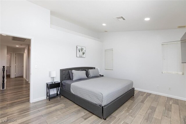 1246 E Gary Ave, Las Vegas, NV 89123 - bedroom featuring light wood-style flooring, recessed lighting, and baseboards