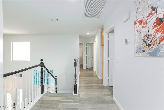 1246 E Gary Ave, Las Vegas, NV 89123 - corridor featuring light wood finished floors, baseboards, recessed lighting, and an upstairs landing