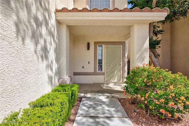 1246 E Gary Ave, Las Vegas, NV 89123 - property entrance with stucco siding and a tile roof