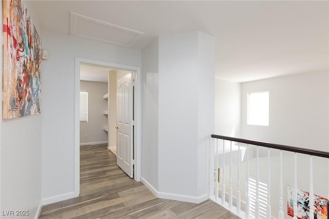 1246 E Gary Ave, Las Vegas, NV 89123 - hallway featuring wood finished floors, attic access, and baseboards