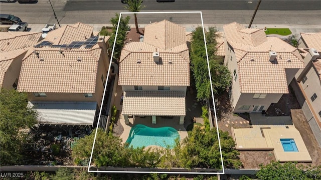 1246 E Gary Ave, Las Vegas, NV 89123 - aerial perspective of suburban area featuring a pool and property parcel outlined
