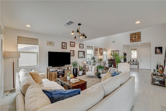 8801 Trotternish Ridge Dr, Las Vegas, NV 89166 - living area with recessed lighting and a chandelier