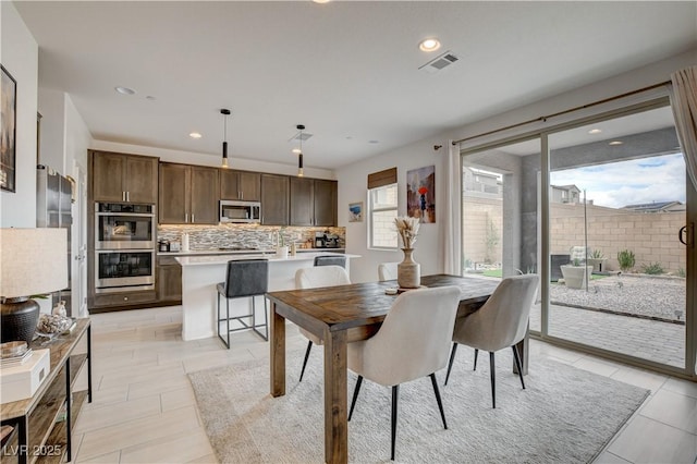 8801 Trotternish Ridge Dr, Las Vegas, NV 89166 - dining room with recessed lighting