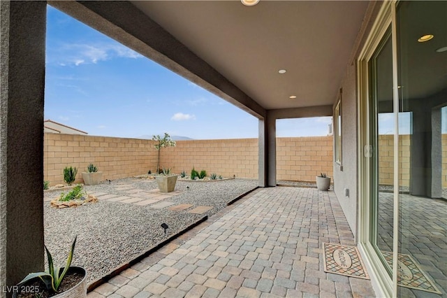 8801 Trotternish Ridge Dr, Las Vegas, NV 89166 - view of patio featuring a fenced backyard