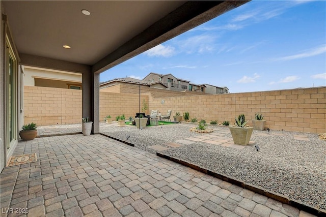 8801 Trotternish Ridge Dr, Las Vegas, NV 89166 - view of patio / terrace featuring a fenced backyard