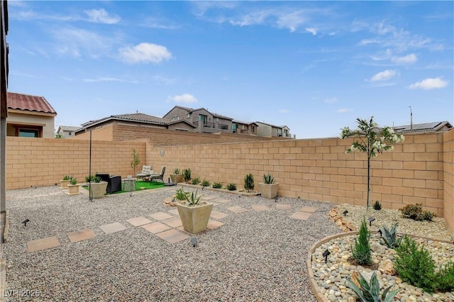 8801 Trotternish Ridge Dr, Las Vegas, NV 89166 - fenced backyard with a patio