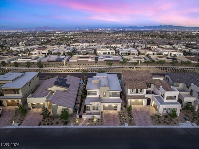 aerial view at dusk of a mountain view and a residential view