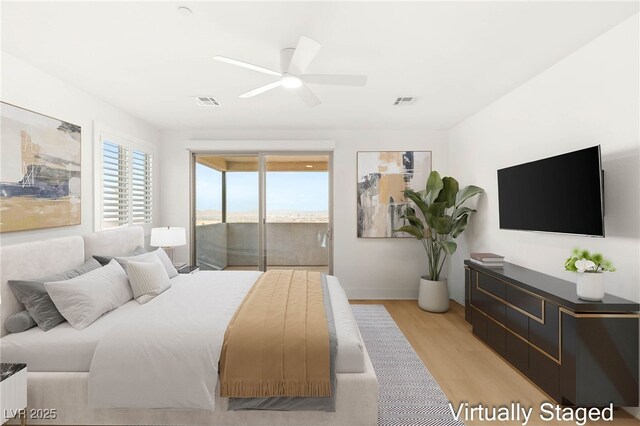 bedroom featuring access to exterior, light wood finished floors, ceiling fan, and baseboards