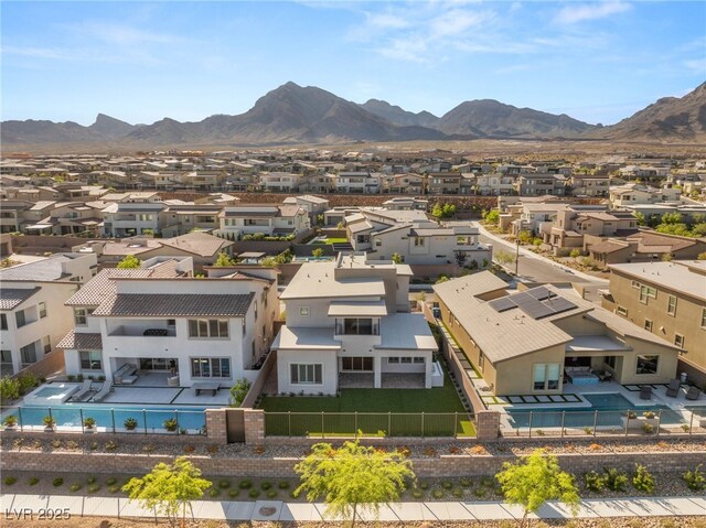 aerial perspective of suburban area with mountains
