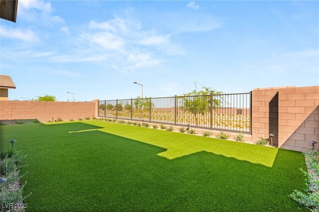 view of fenced backyard