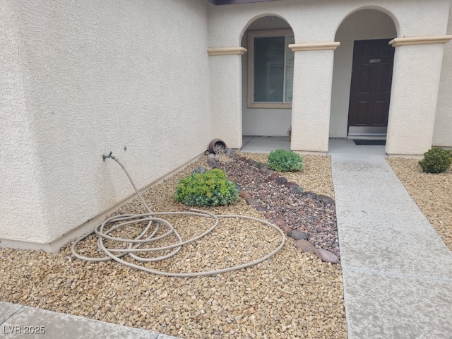 1006 Cove Palisades Dr, North Las Vegas, NV 89031 - entrance to property featuring stucco siding