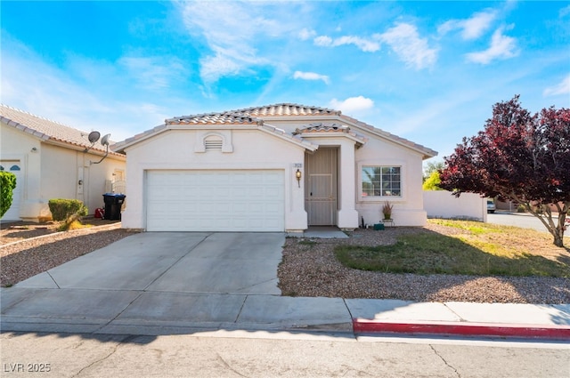 3839 Dusty Glen Ct, North Las Vegas, NV 89032 - mediterranean / spanish-style house with a tiled roof, an attached garage, concrete driveway, and stucco siding