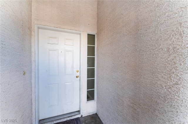 3839 Dusty Glen Ct, North Las Vegas, NV 89032 - doorway to property with stucco siding