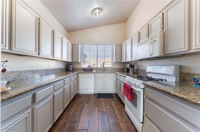 3839 Dusty Glen Ct, North Las Vegas, NV 89032 - kitchen with white appliances, a sink, dark wood finished floors, and light stone countertops