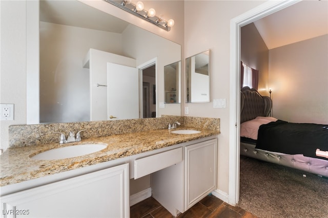 3839 Dusty Glen Ct, North Las Vegas, NV 89032 - ensuite bathroom with wood finished floors and double vanity