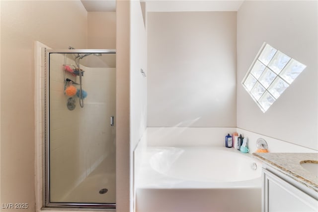 3839 Dusty Glen Ct, North Las Vegas, NV 89032 - full bath featuring a shower stall, a garden tub, and vanity