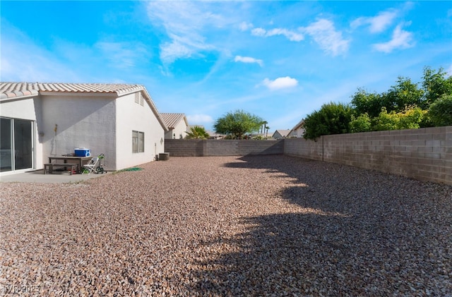 3839 Dusty Glen Ct, North Las Vegas, NV 89032 - fenced backyard with a patio area and central air condition unit