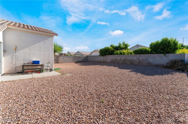 3839 Dusty Glen Ct, North Las Vegas, NV 89032 - fenced backyard featuring a patio area