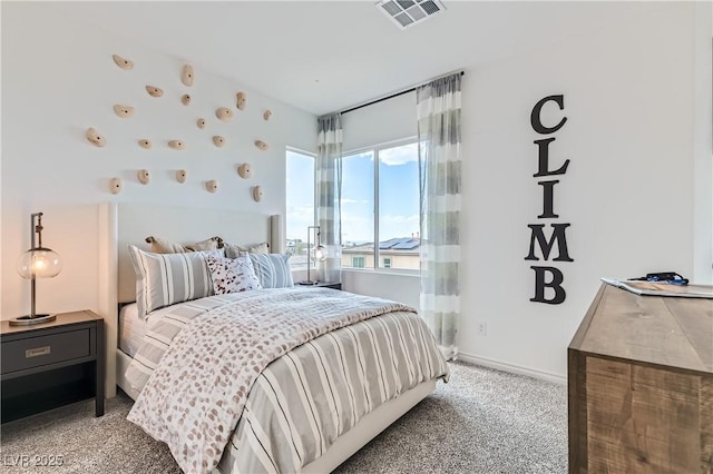 bedroom with light colored carpet
