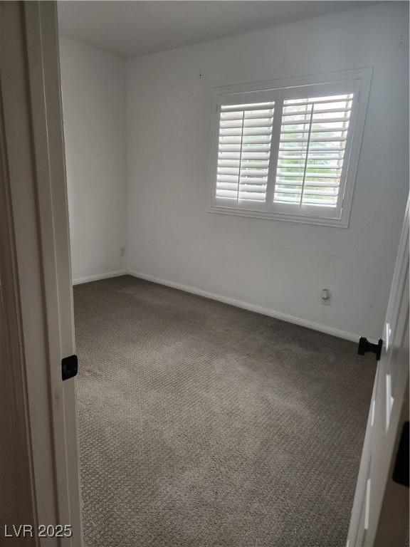 8355 Cabin Peak St, Las Vegas, NV 89123 - carpeted empty room featuring baseboards
